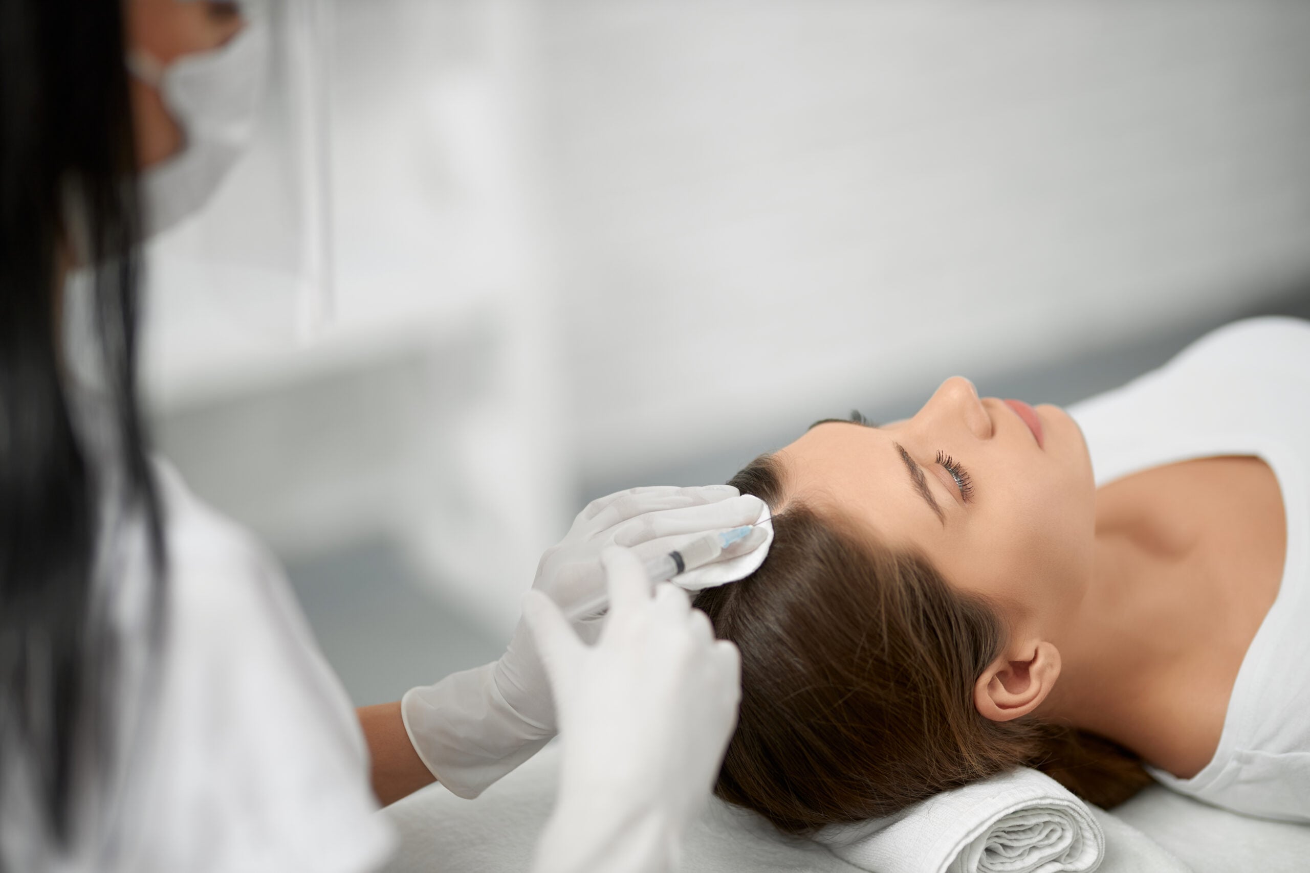 female hair transplant procedure in Turkey close-up natural results clinic