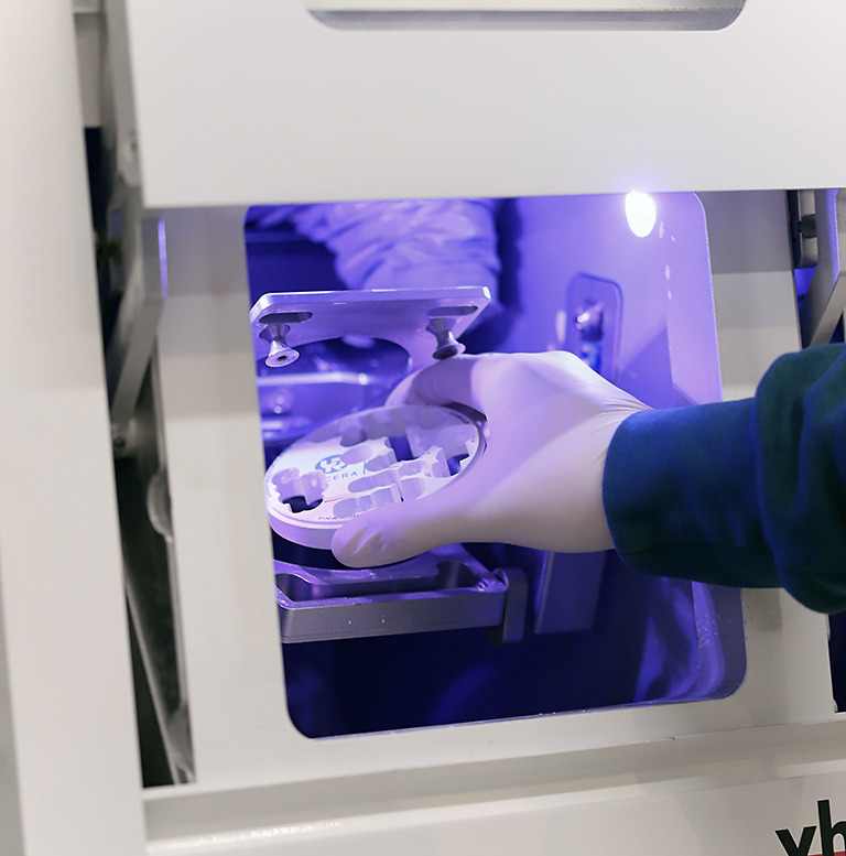 High-precision VHF 3D printers in action, manufacturing dental crowns at Natural Clinic