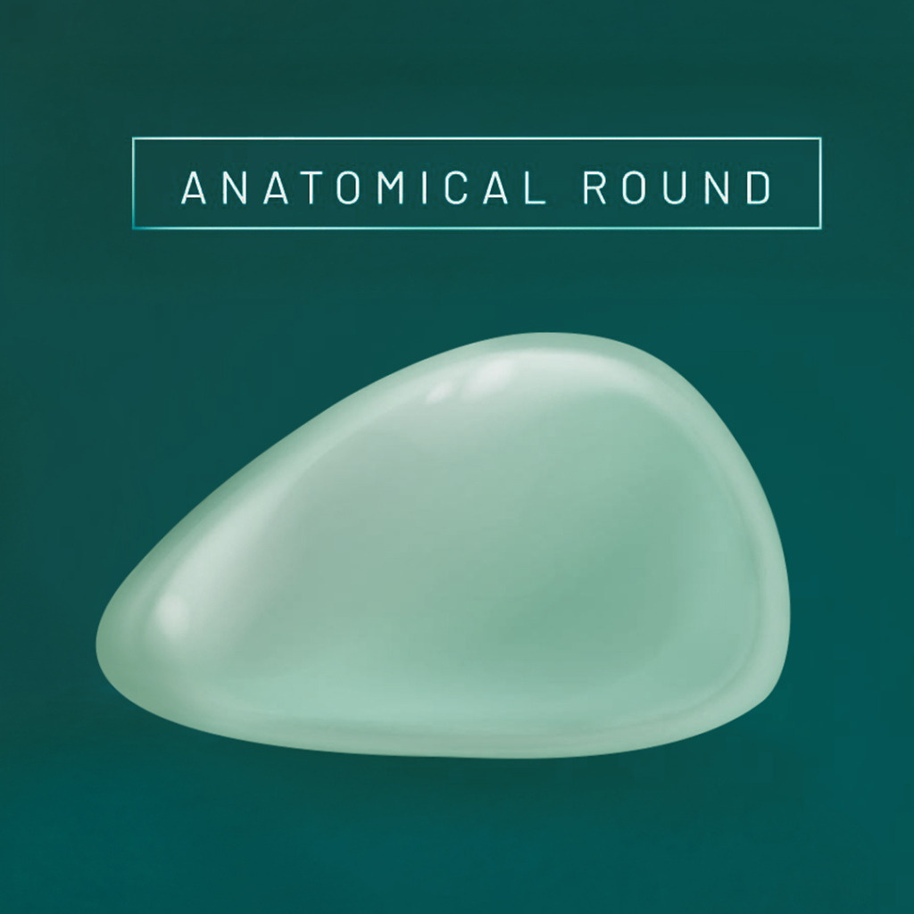 Anatomic round breast implant for a natural yet full appearance