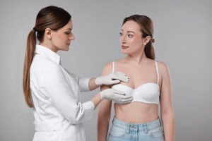 Breast lift consultation in Turkey doctor explaining mastopexy procedure to patient